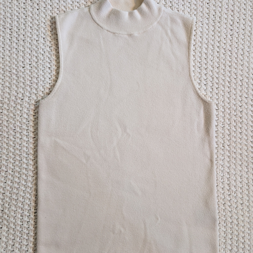 Elegant Cream Sleeveless Turtleneck Top